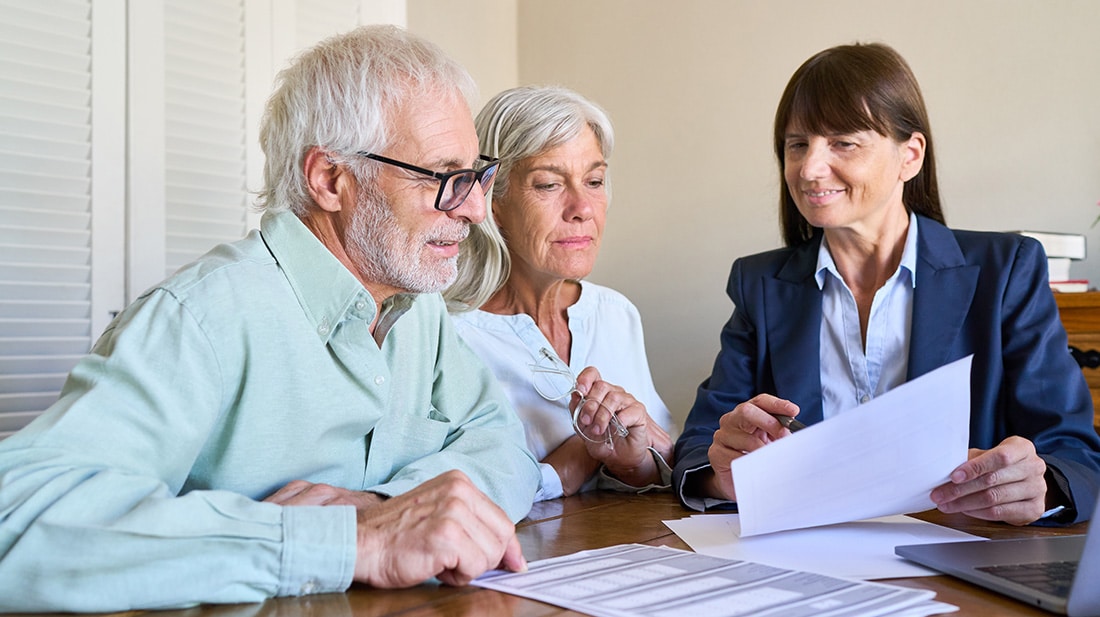 bank account employee showing residents paperwork