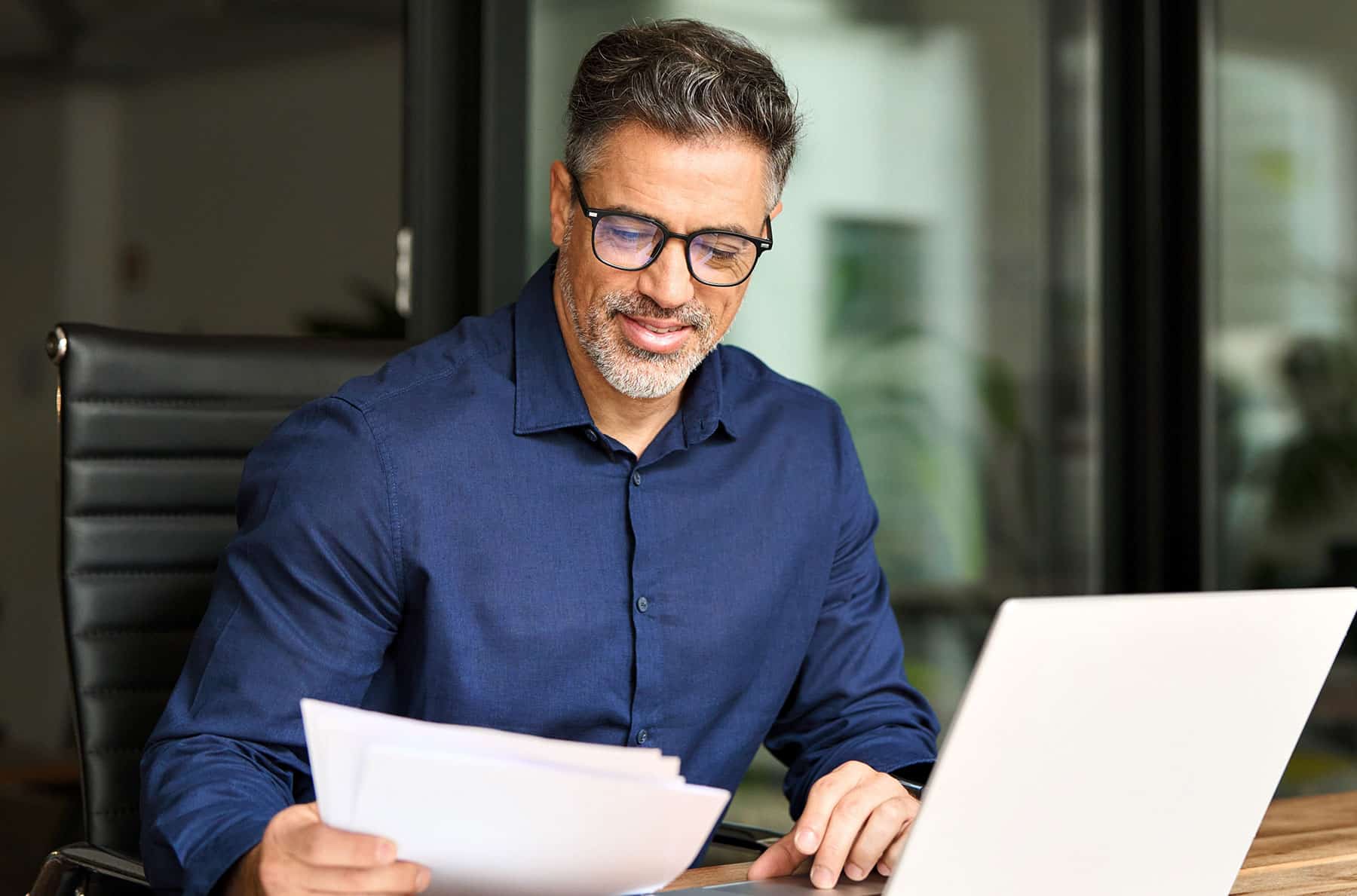 Man Looking Over Financing