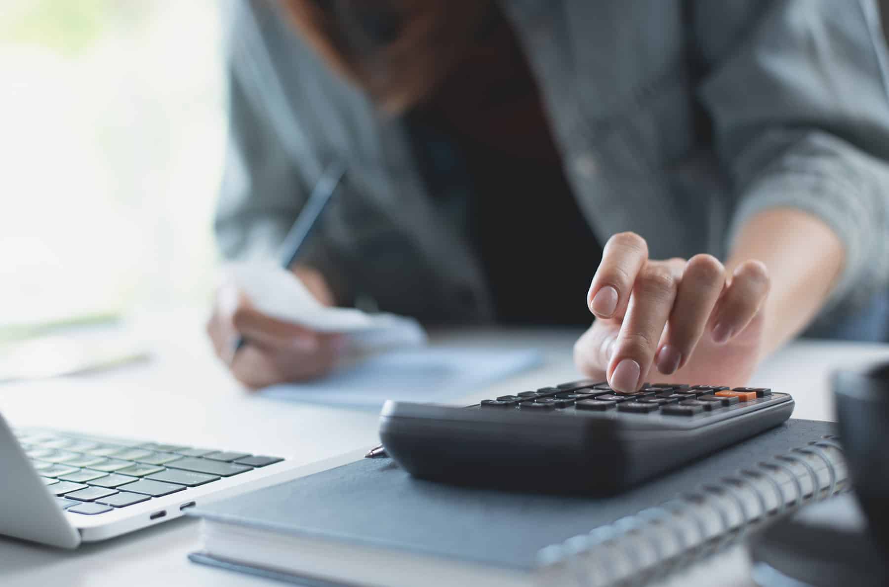 Woman Calculating Budget