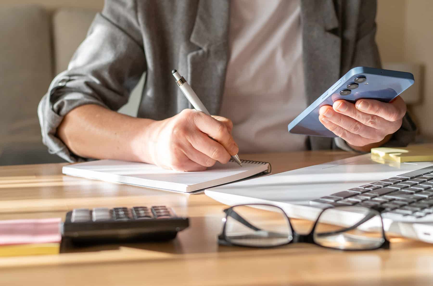 community resident making bill payments on phone