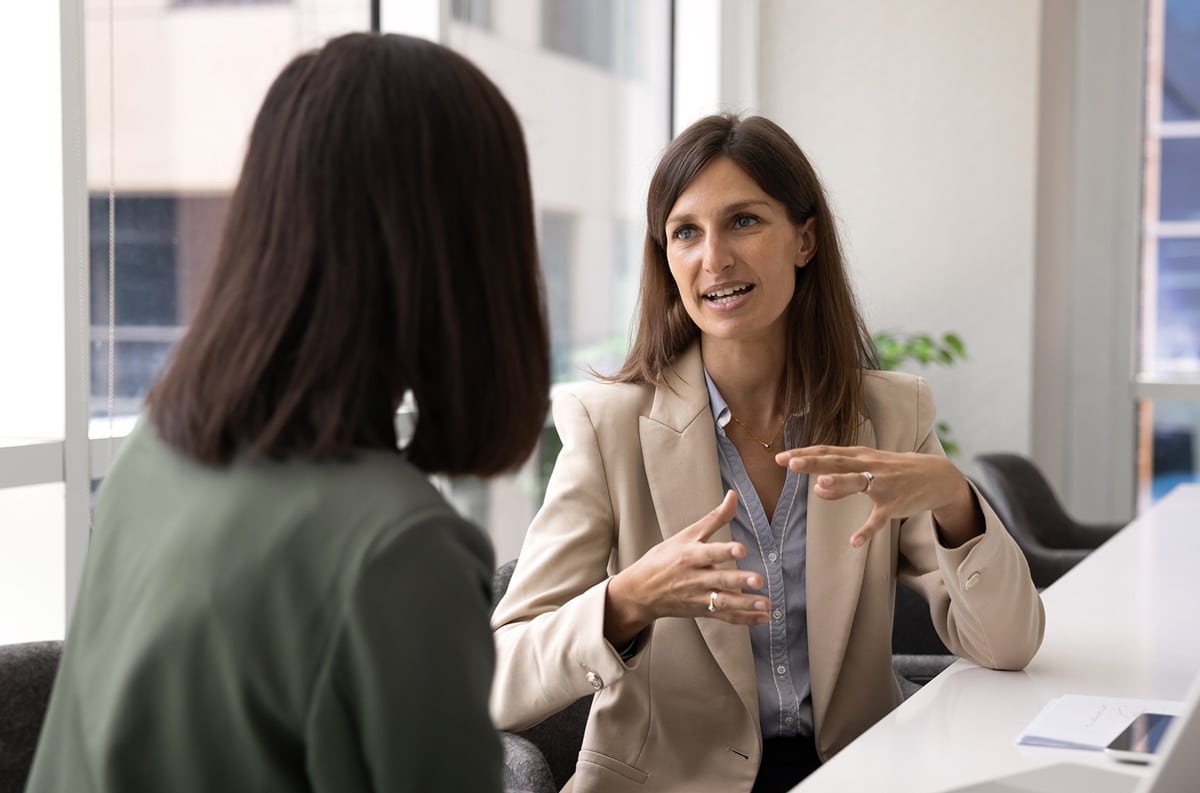 customer relation manager talking to client
