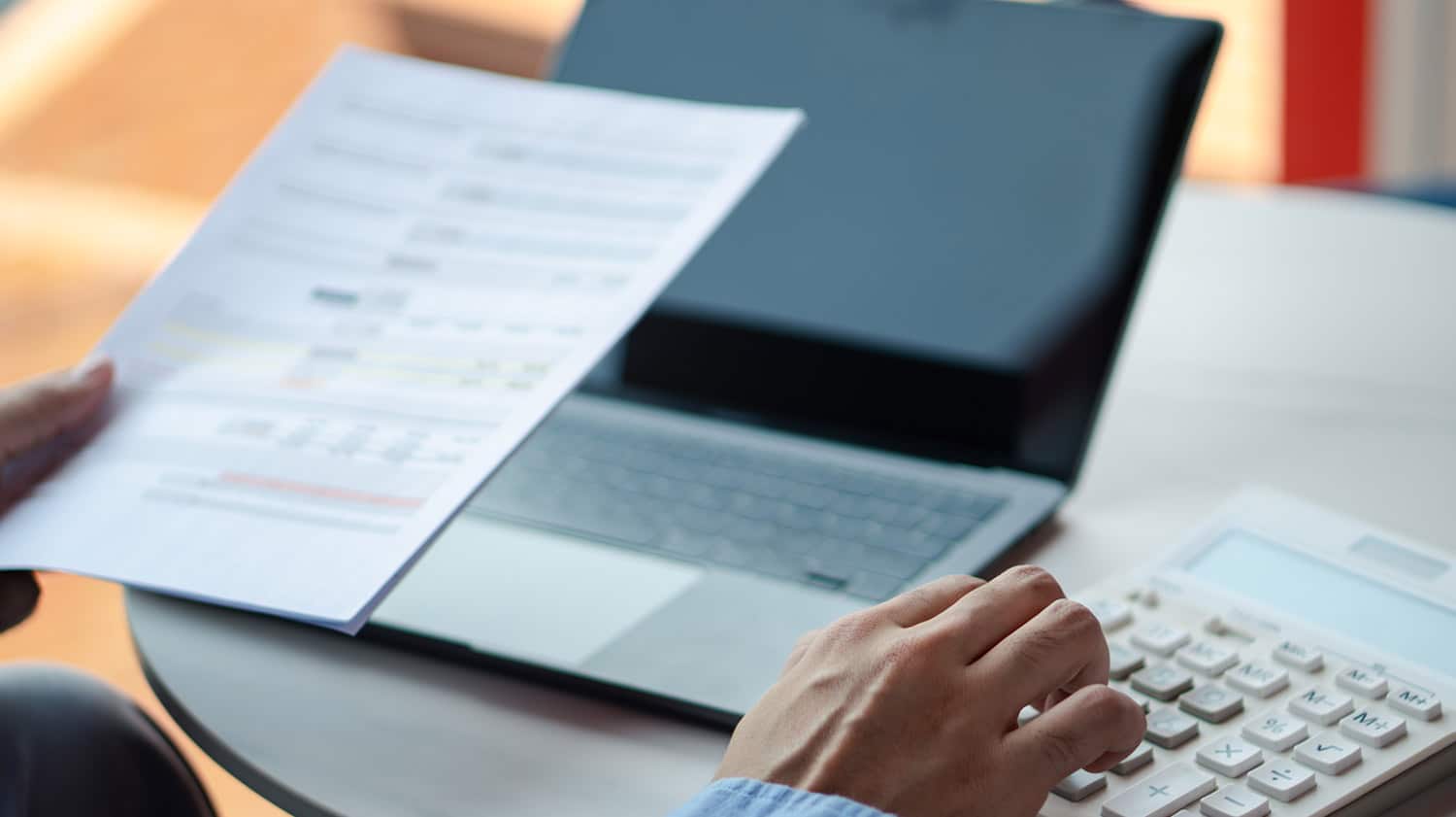 female financial manager calculating bills