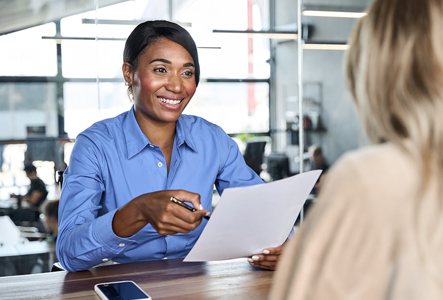female bank employee talking to client