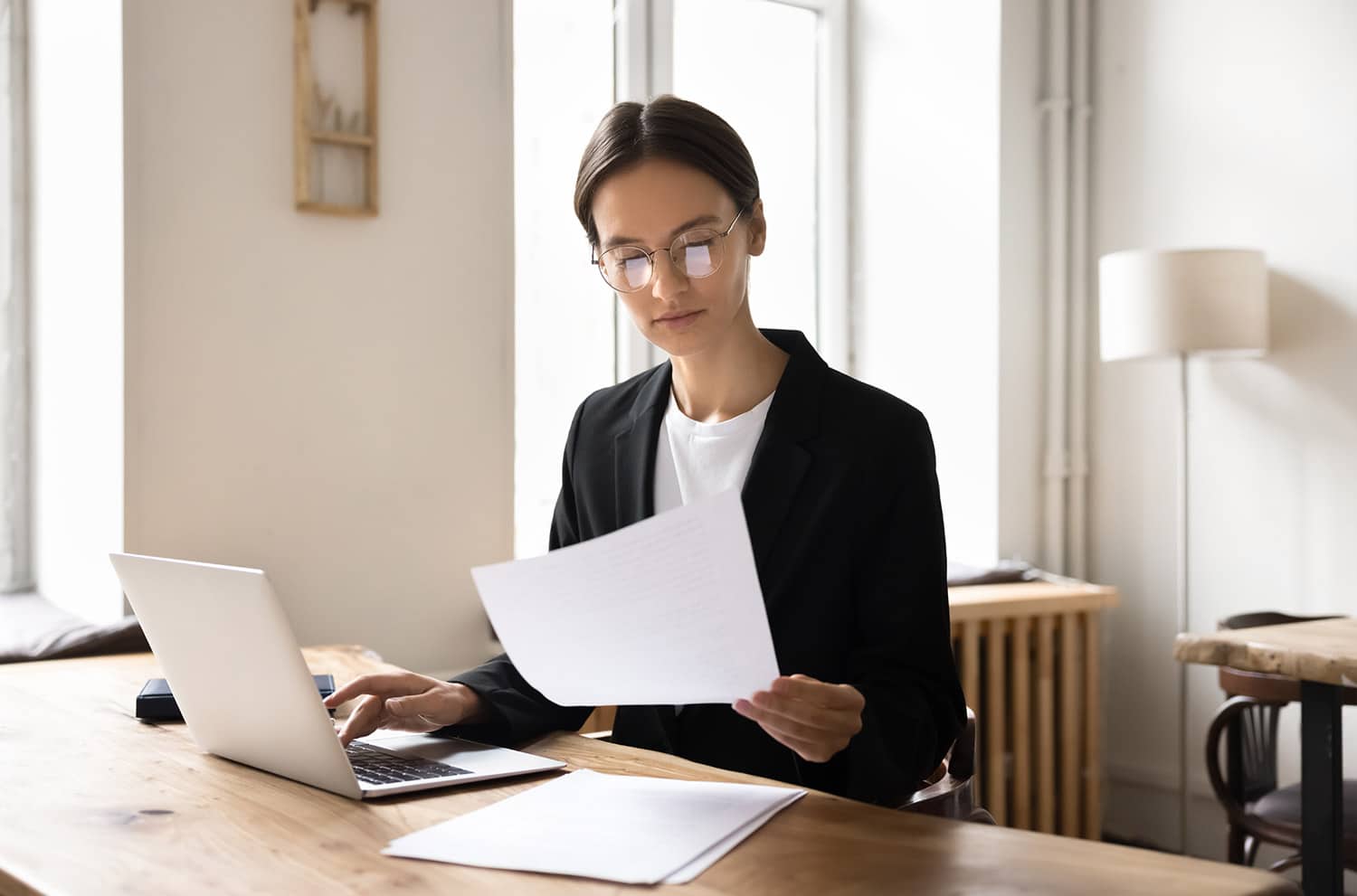 female financial manager checking account balance