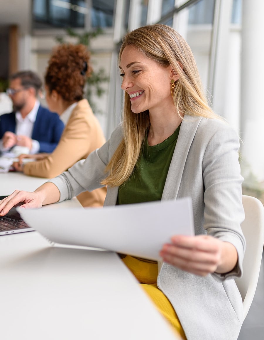 female financial manager going through financial data