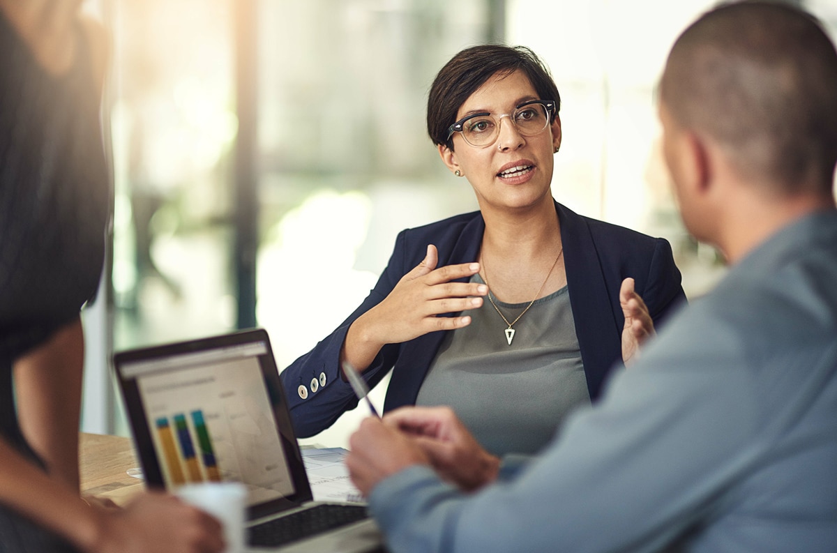 female financial manager talking to clients