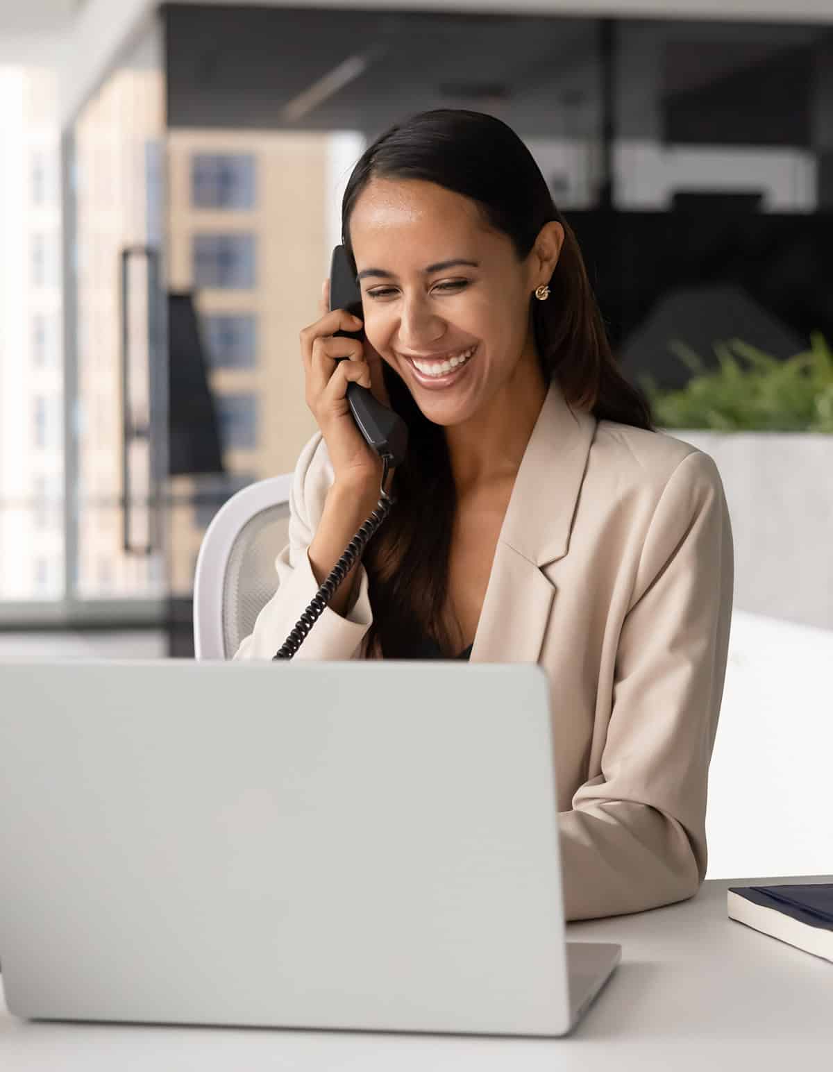 female vendor manager talking on phone
