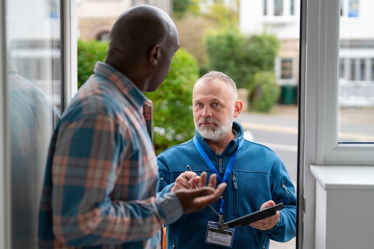 field inspector talking to client