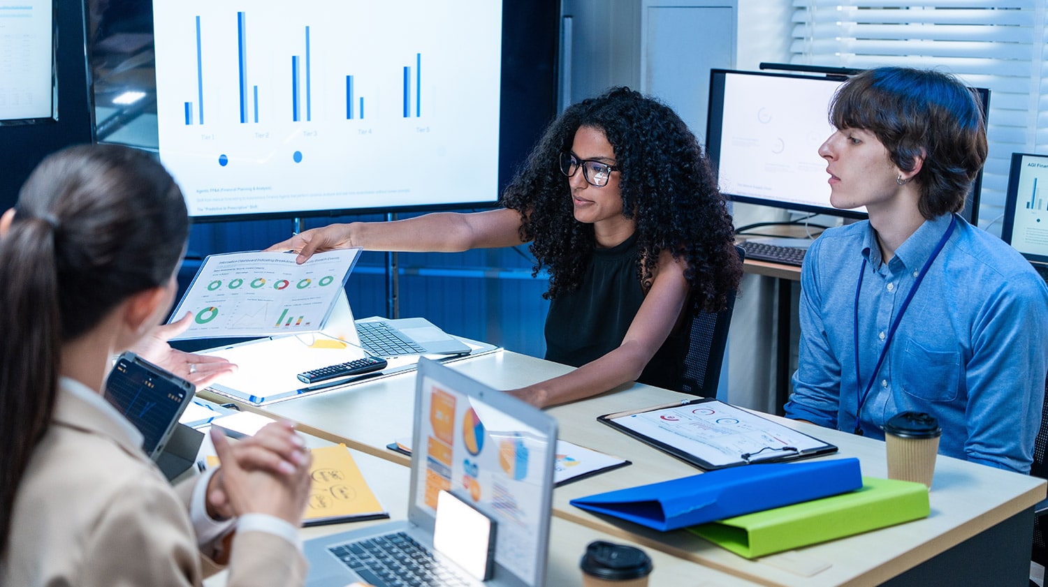 financial managers in a meeting for quarterly reports