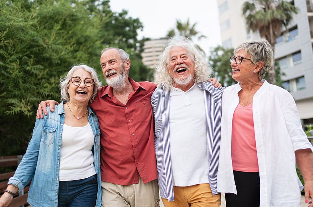 group of elders smiling and laughing
