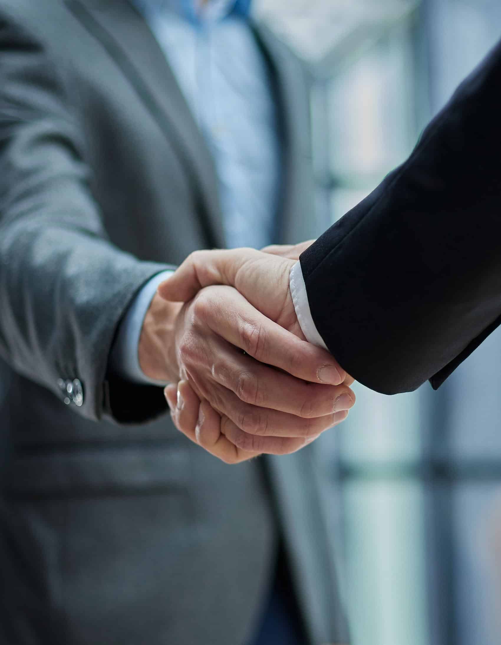 two developers handshaking