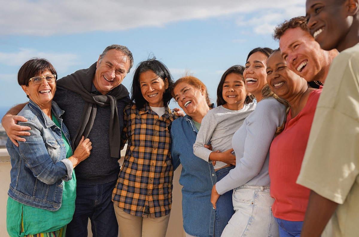 happy elderly community huddled