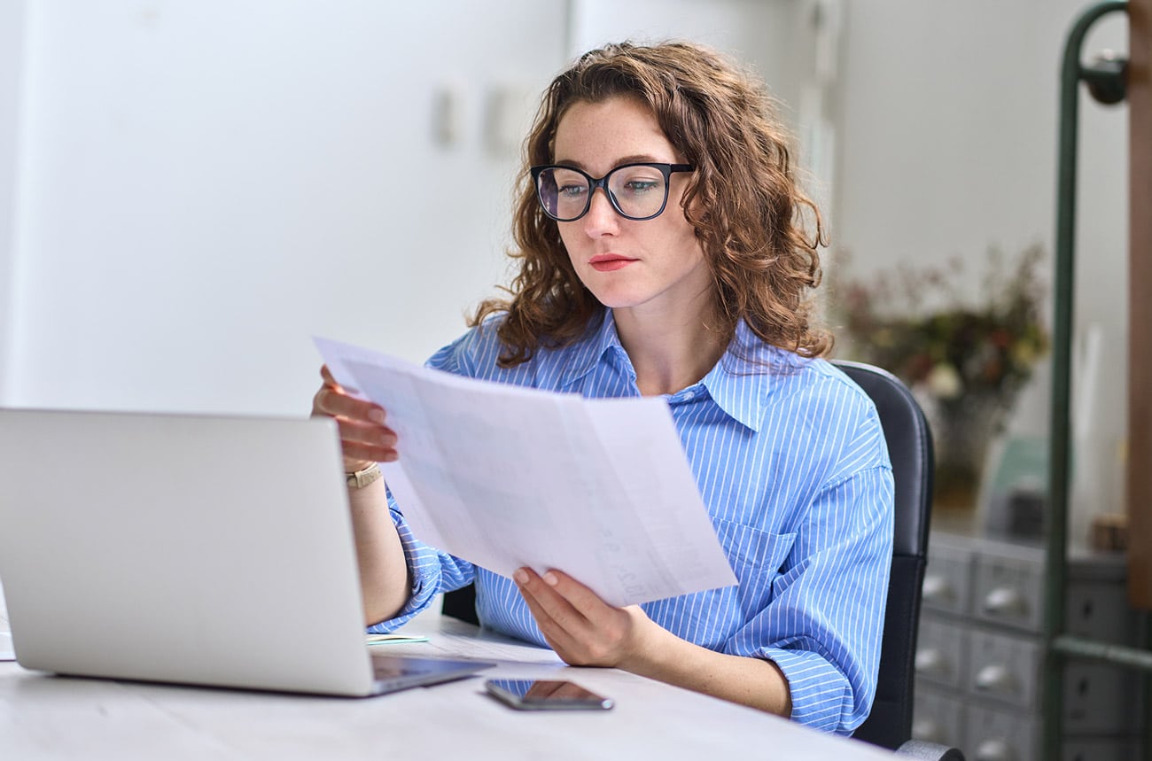 insurance manager checking financing logs