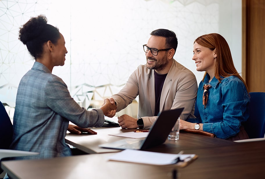 insurance manager talking to clients