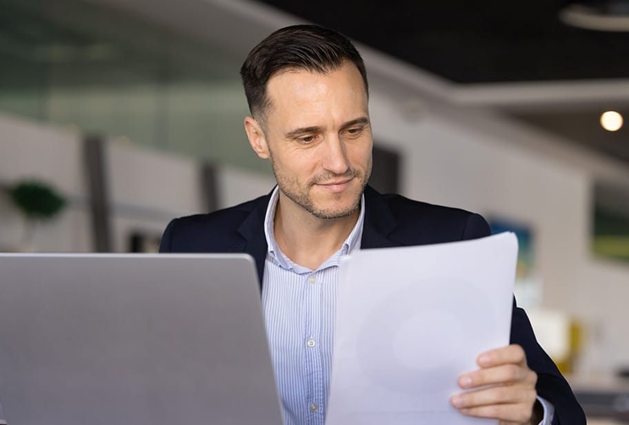 male bill manager checking bills