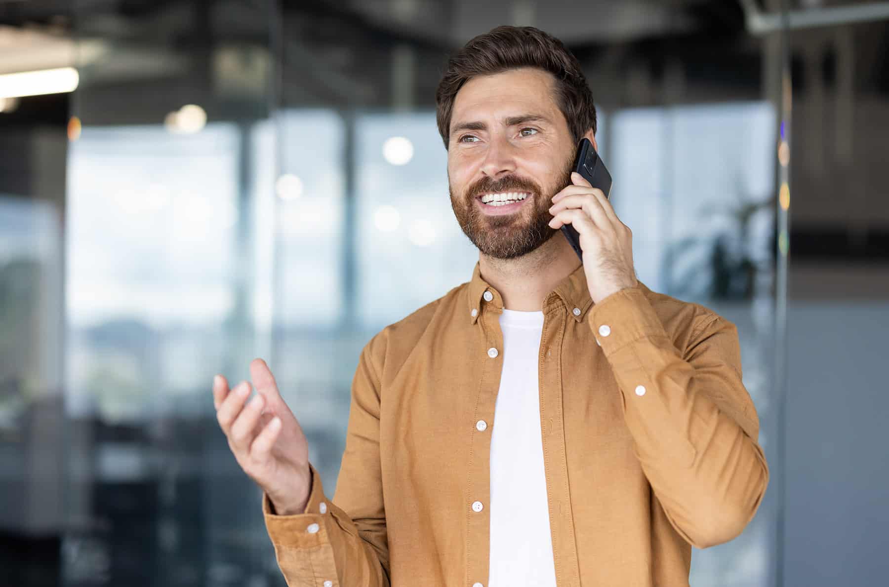 male community vendor talking on phone