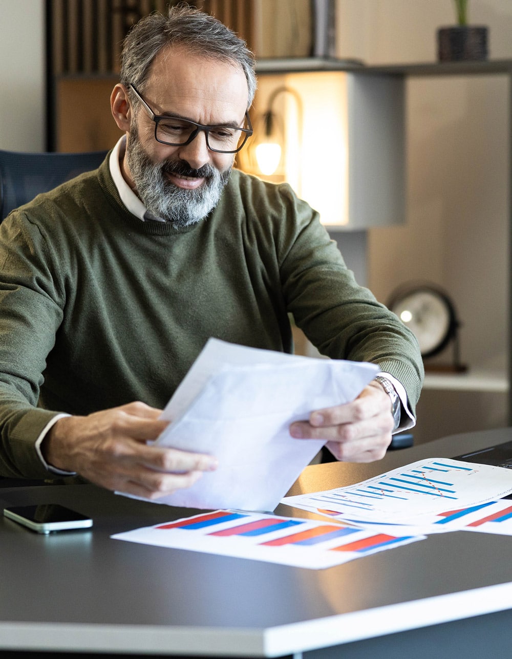 man checking budget and balances