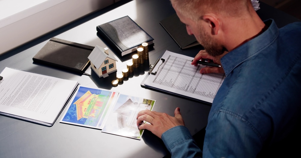 man checking documents financial planning