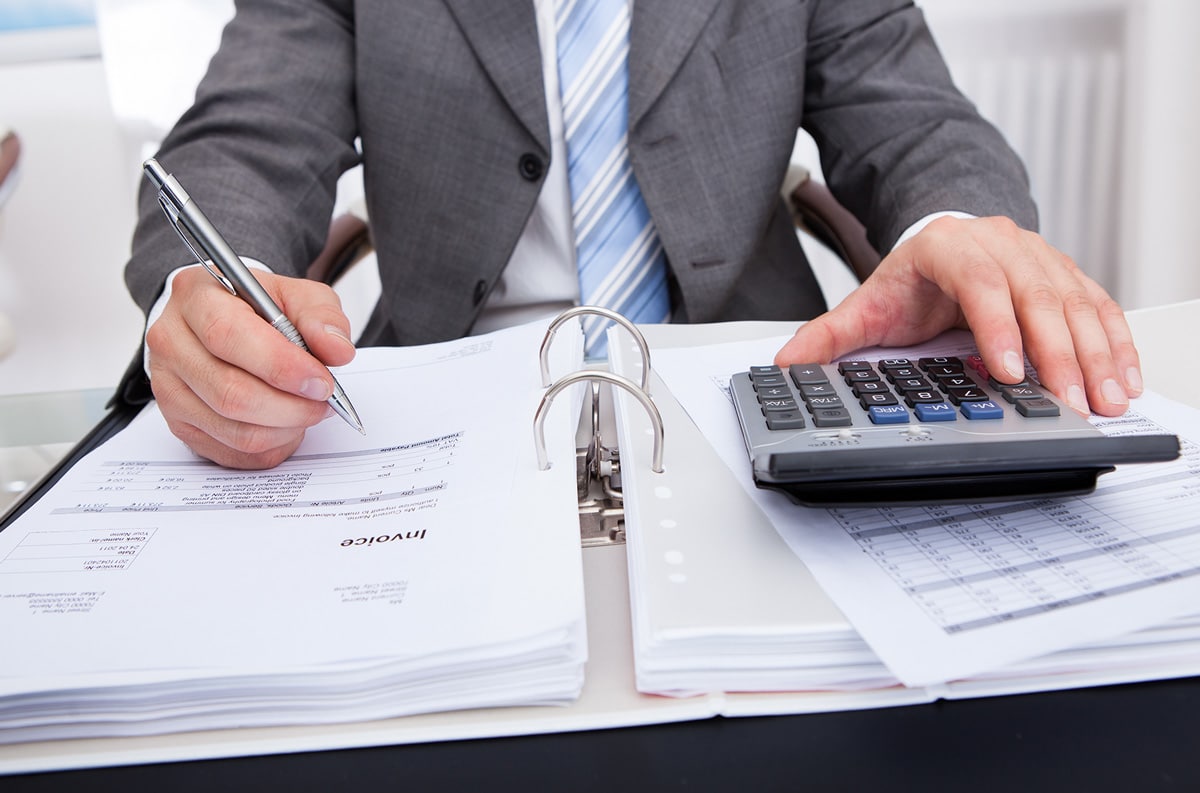 man doing financial audit