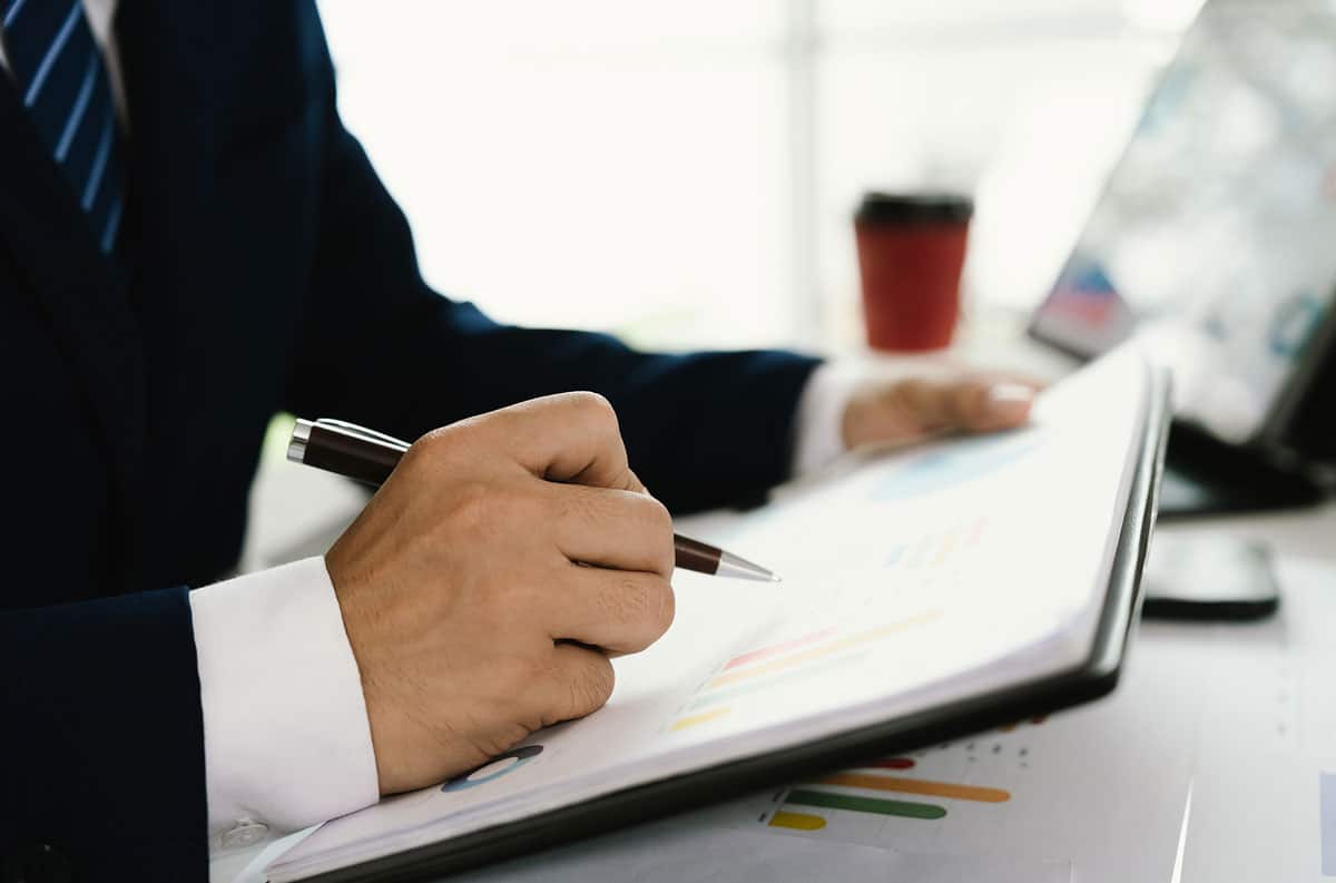 marketing manager writing financial report