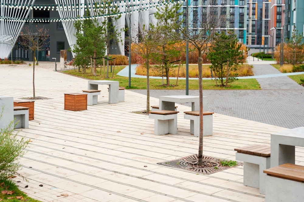 modern urban park empty benches and tables