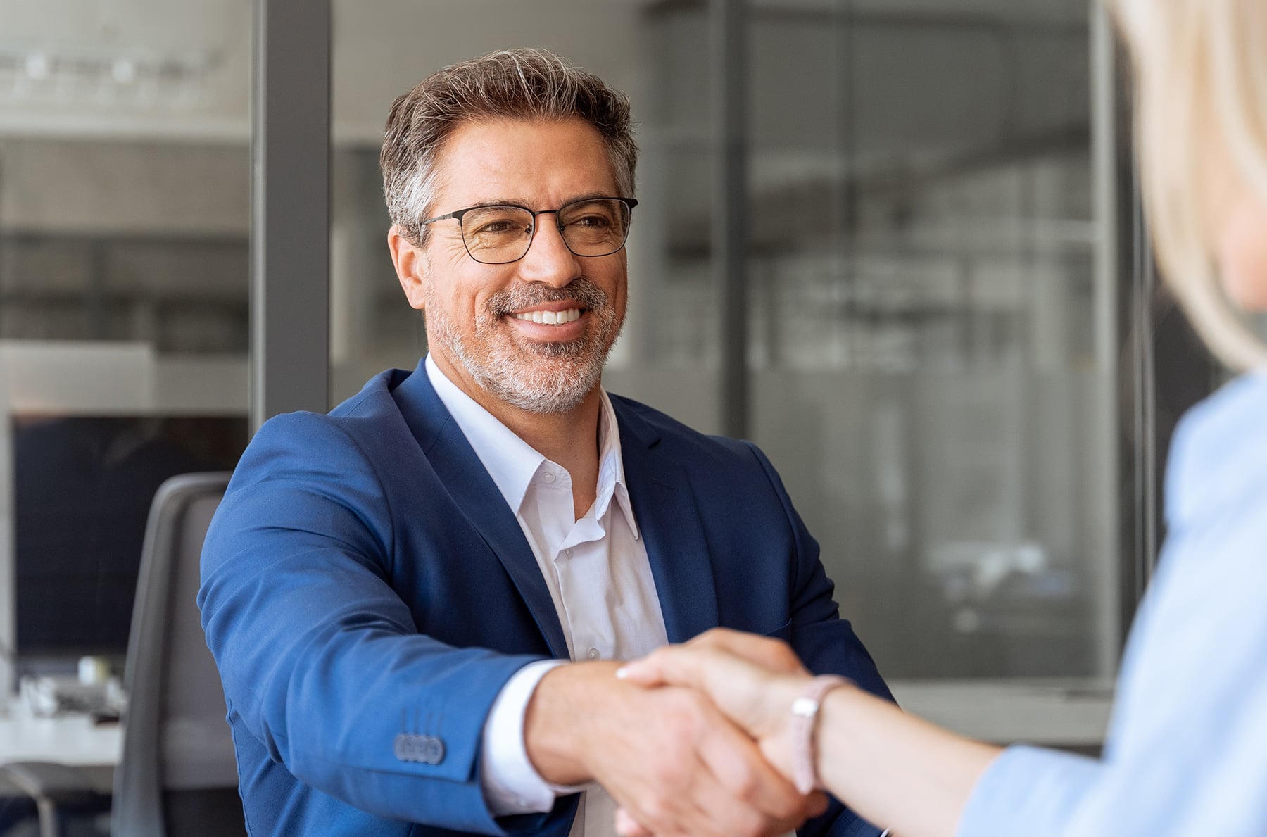 munipal service employee shaking hands with client