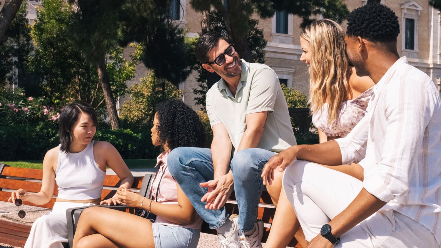 neighbors chatting outdoors neighborhood park bench