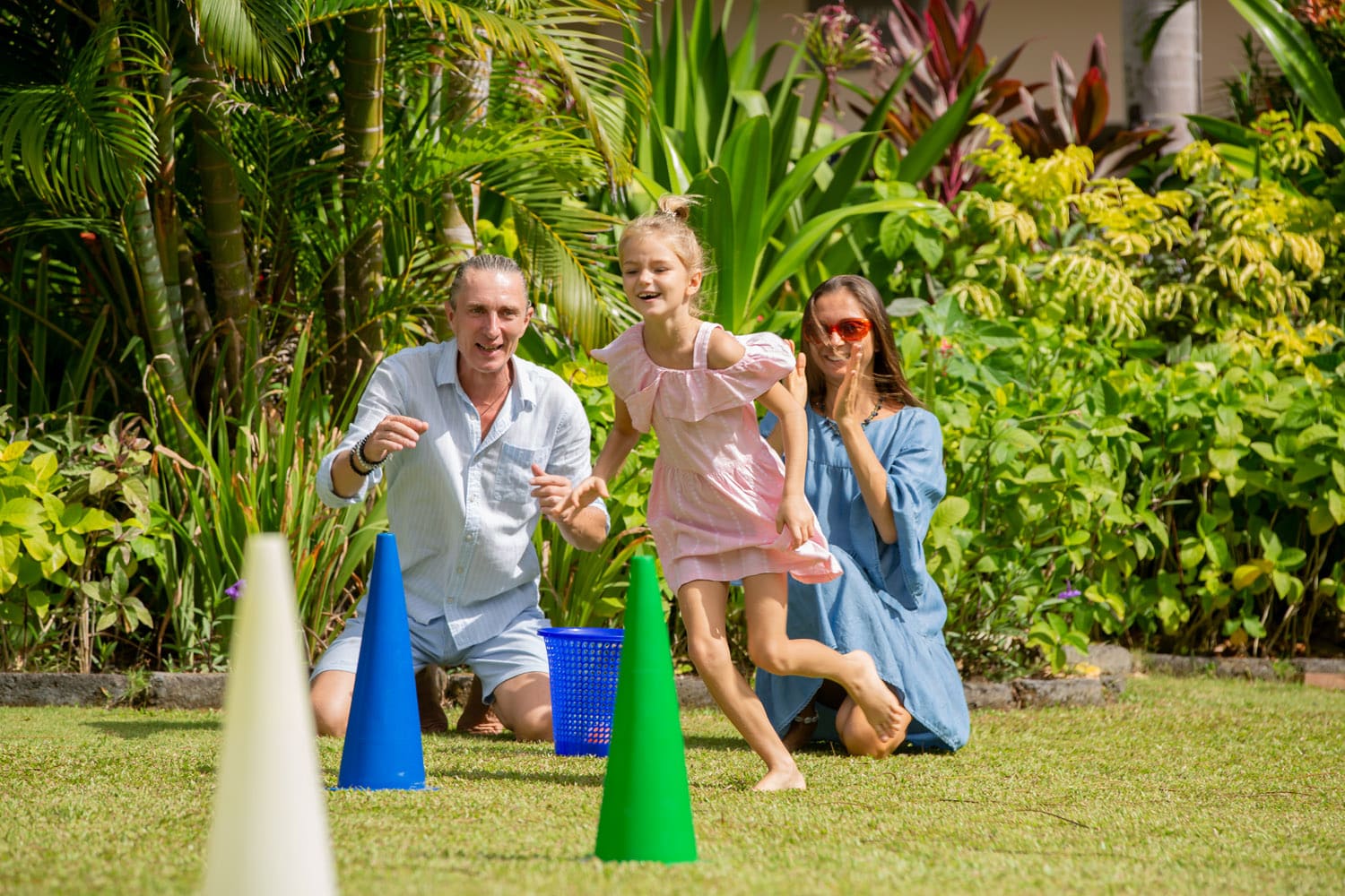 parents and kid playing in community event gathering