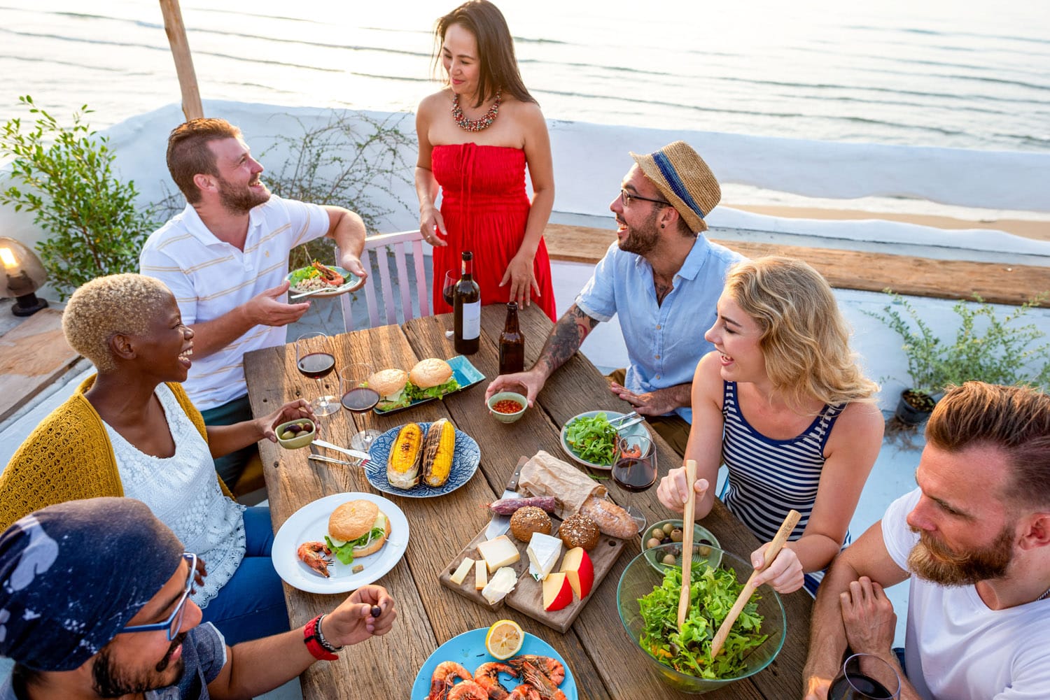 residents social gathering at neighborhood clubhouse patio
