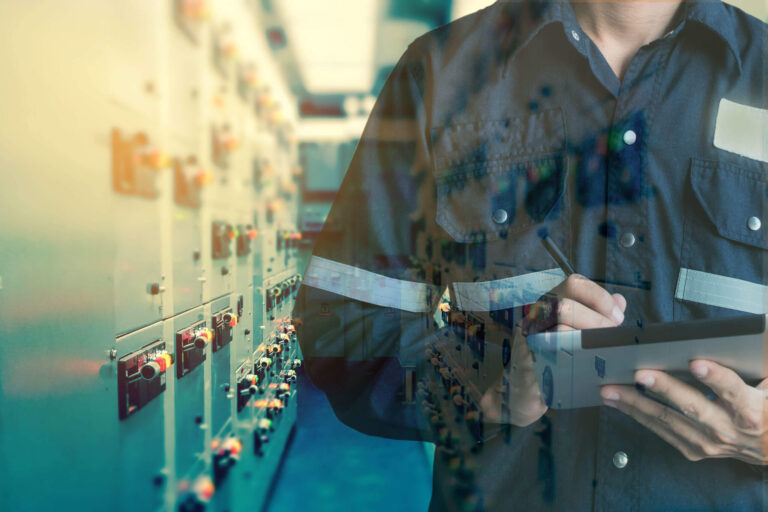 man taking notes on ipad