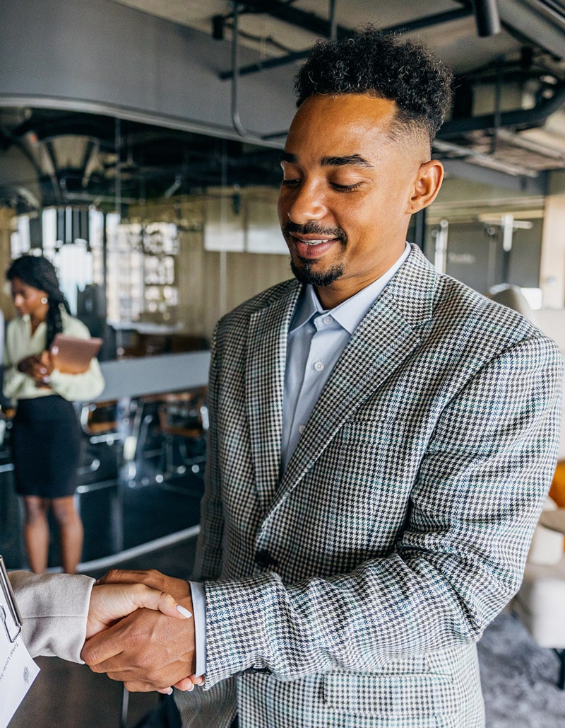 vendor shaking hand with client