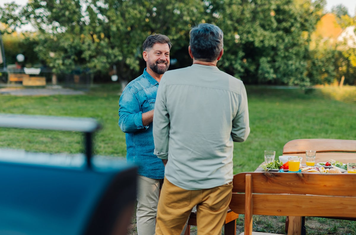 two community members in backyard