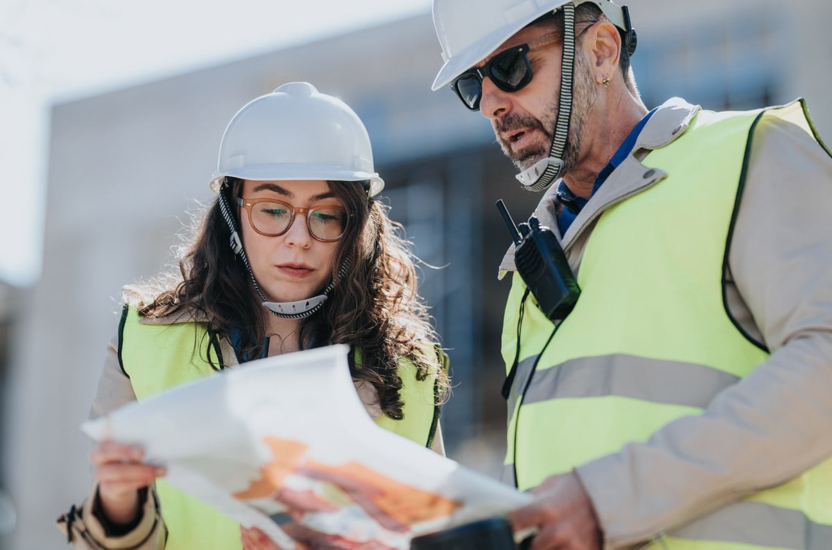 two contractors talking about work order