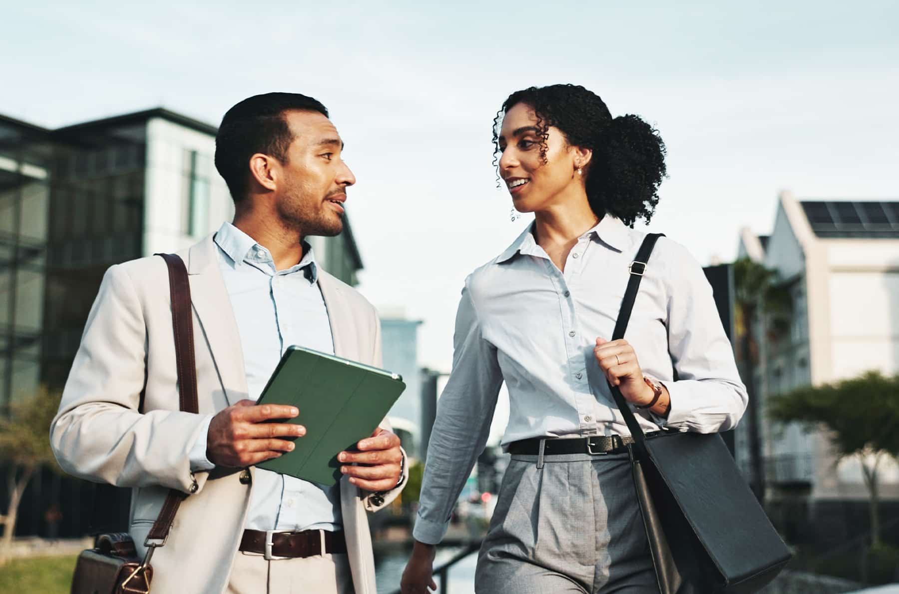 two district managers talking about project