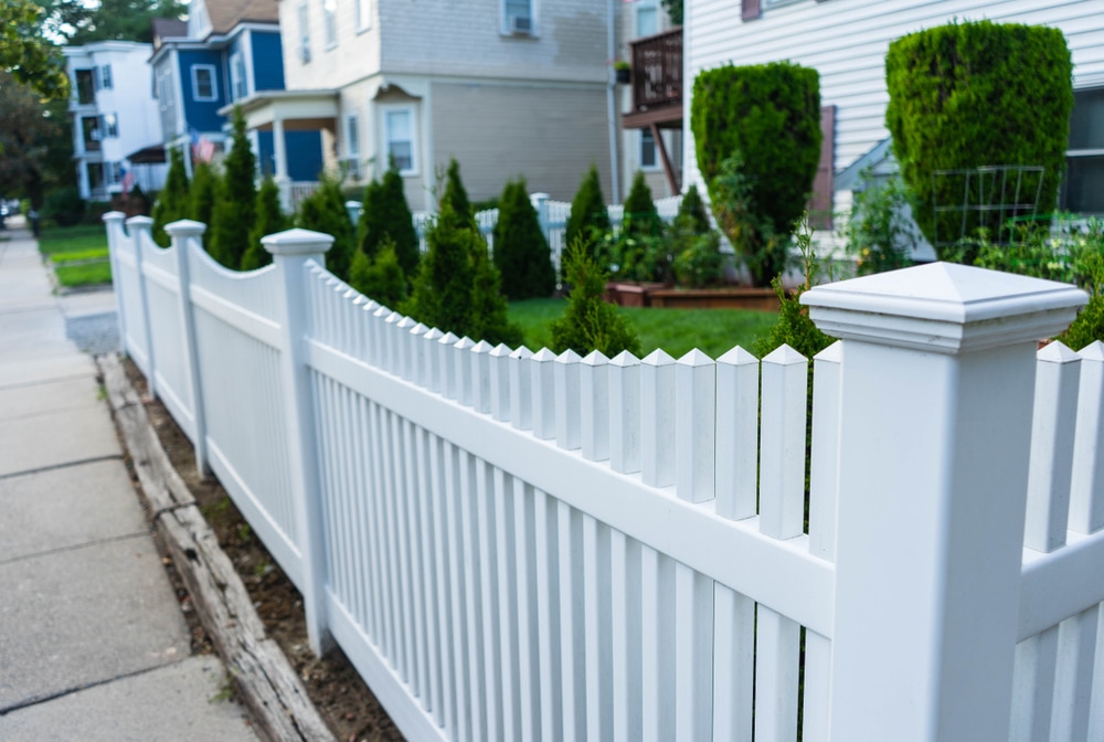 White picket fence in a residential neighborhood