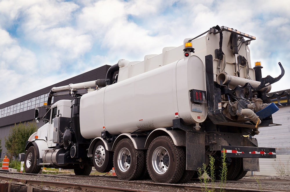 white vacuum truck
