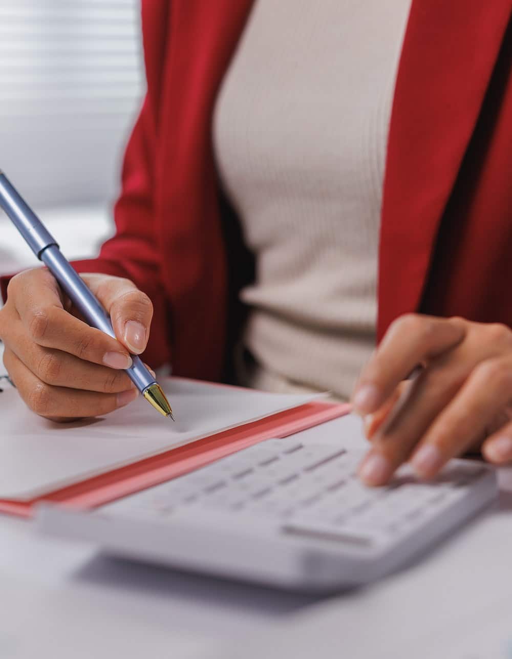 woman calculating budget