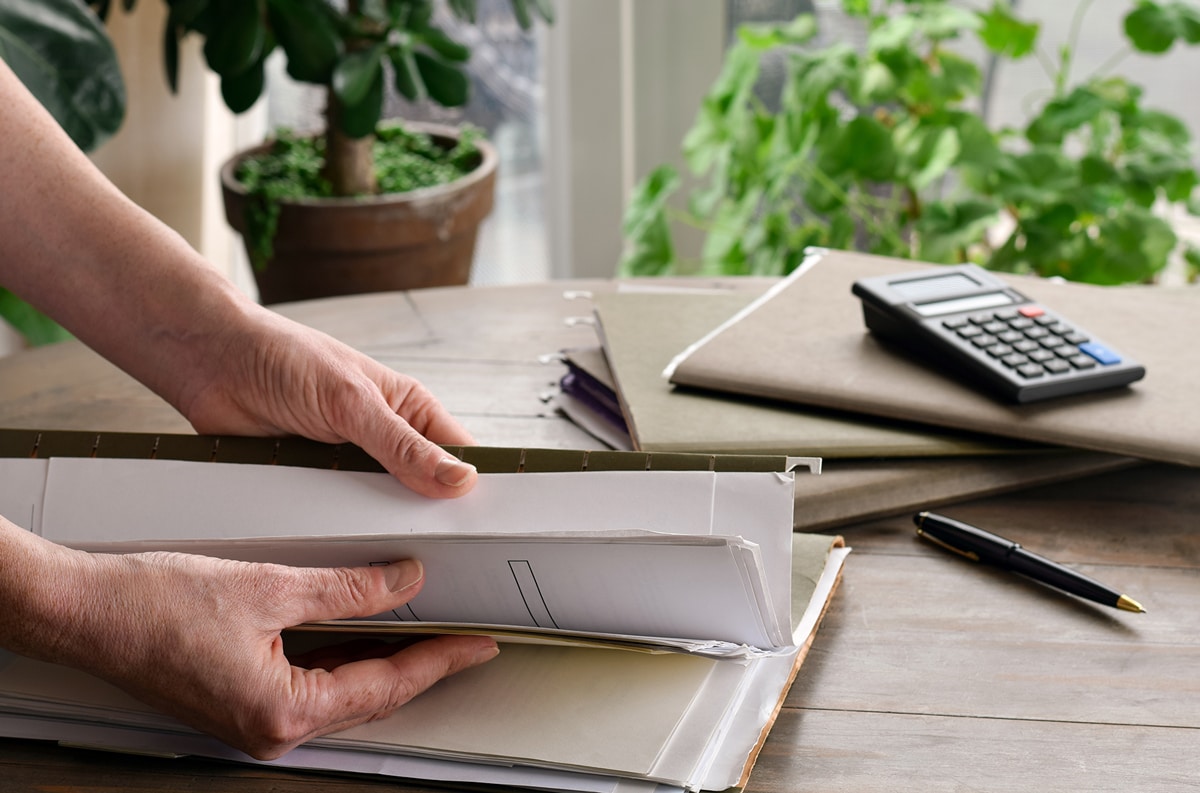 woman sorting through finances
